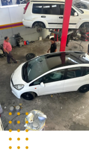 Expert car mechanics working at Perfect Zone workshop in Abu Dhabi
