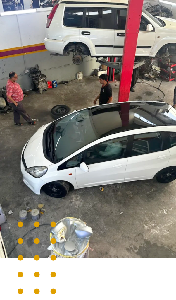 Expert car mechanics working at Perfect Zone workshop in Abu Dhabi