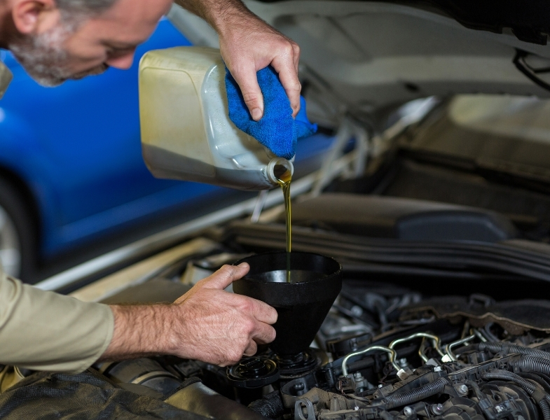 Engine Oil Inspection during Car Maintenance in Musaffah Abu Dhabi